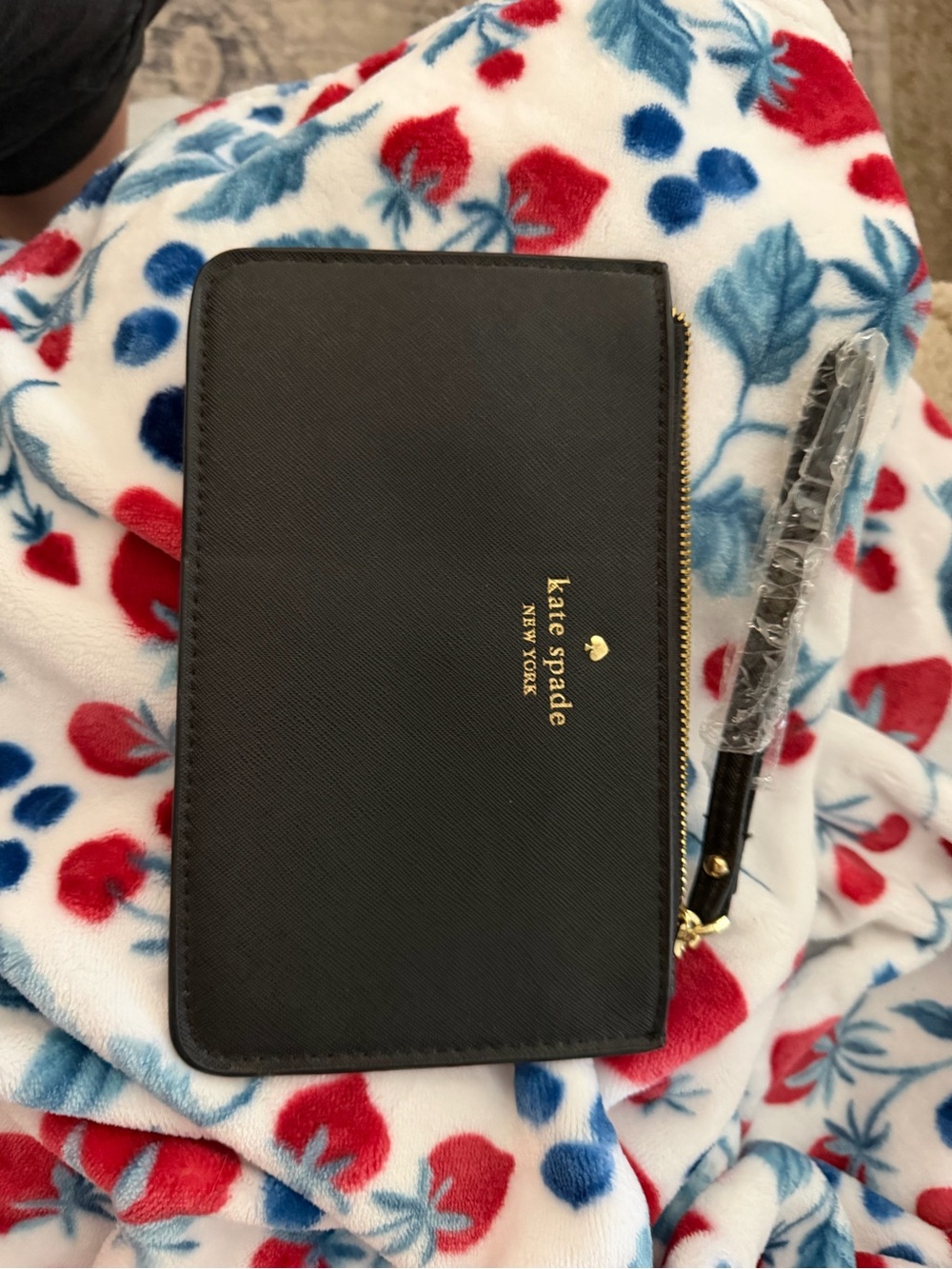 kate spade black zip-around wristlet with gold logo